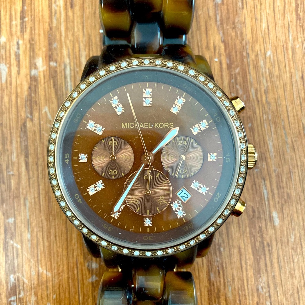 Michael Kors Tortise shell large face watch.